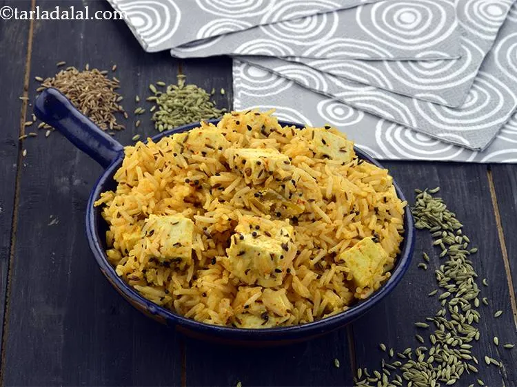 Step 29 – Serve <strong>Achari Paneer Pulao</strong> hot garnished with coriander.