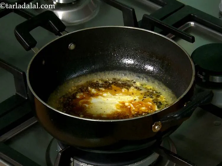 Step 32 – Before adding the curd, remember to switch off the flame. This is to prevent the …