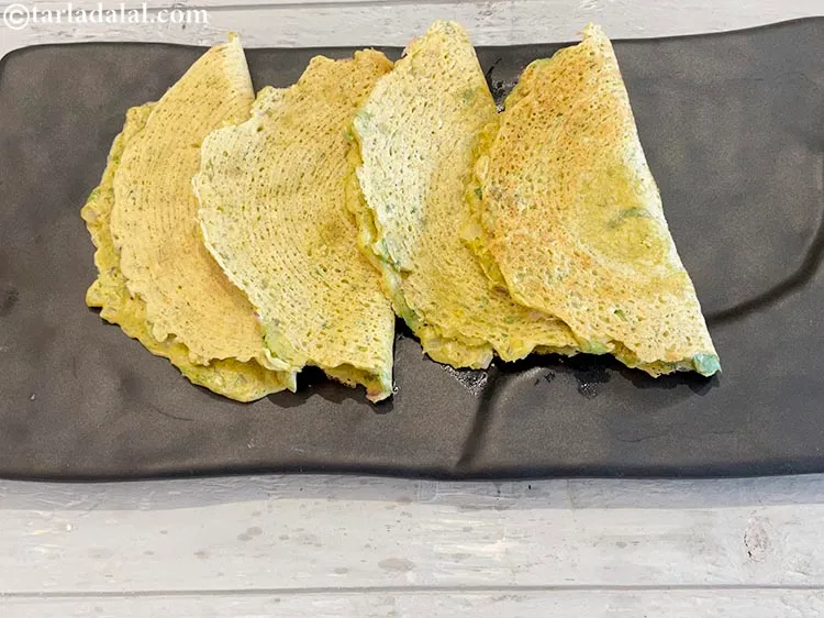 Step 27 – Fold <strong>healthy adai |&nbsp;diabetic adai&nbsp;|&nbsp;Indian style dalia adai without rice&nbsp;|&nbsp;Indian snack for diabetes&nbsp;|&nbsp;</strong>over to make …