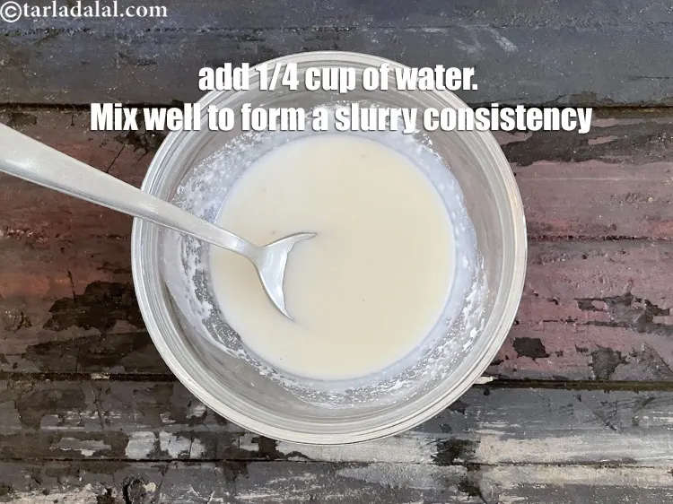 Step 12 – Add 1/4 cup of water. Mix well to form a slurry consistency.
