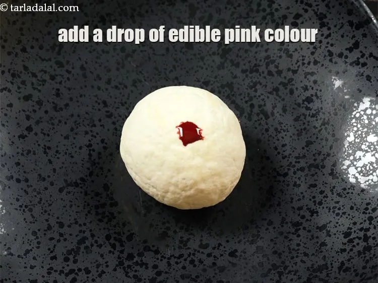 Step 10 – Add few drops of edible&nbsp;<a href="https://www.tarladalal.com/glossary-pink-colour-364i">pink colour</a>. It is optional.