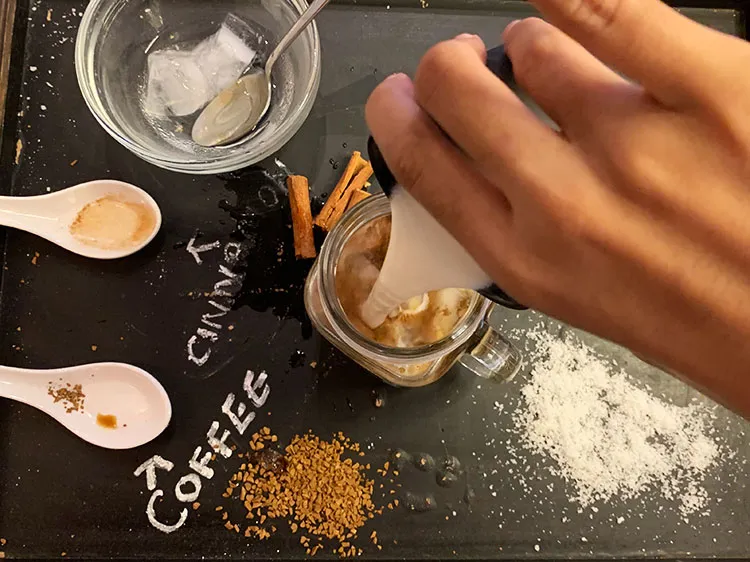 Step 10 – Remove the stirrer, finally add the coconut milk to the&nbsp;<strong>Healthy Iced Coffee</strong>&nbsp;for the ripple effect …