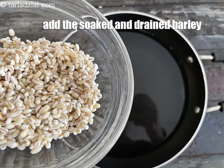 Step 18 – <meta charset="UTF-8" />Add the soaked and drained&nbsp;barley.&nbsp;<br /> &nbsp;