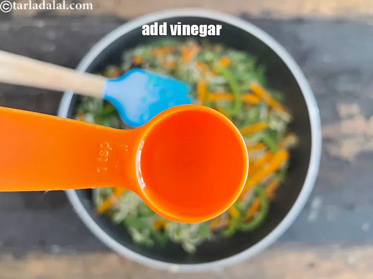 Step 22 – Add 1 tsp&nbsp;<a href="https://www.tarladalal.com/glossary-vinegar-sirka-cooking-vinegar-341i">vinegar</a>.