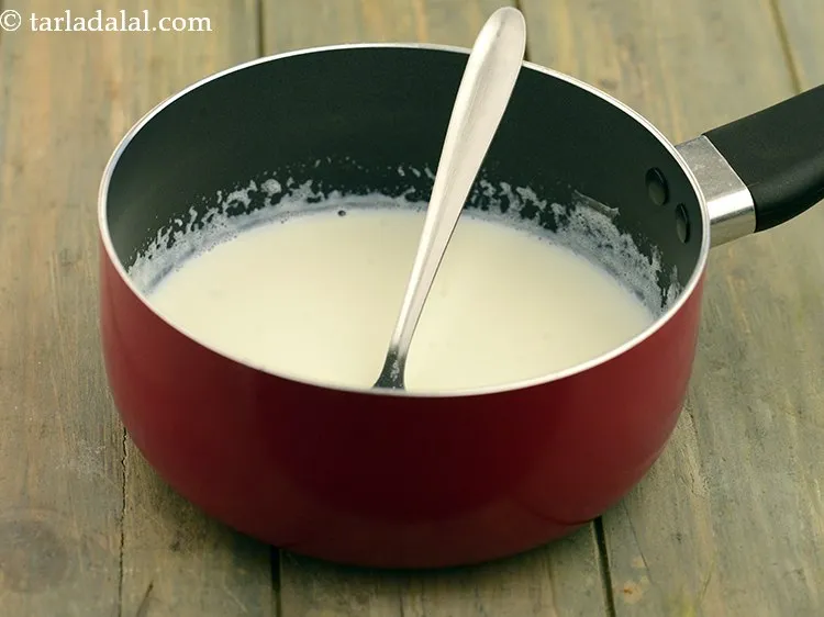 Step 5 – Boil 1 cup&nbsp;<a href="https://www.tarladalal.com/glossary-milk-514i">milk</a> in a saucepan.&nbsp;1 cup of&nbsp;<a href="https://www.tarladalal.com/recipes-using-milk-514">milk</a>&nbsp;provides 70% of the Recommended Daily …