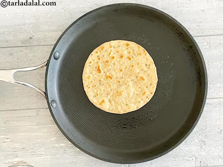 Step 23 – Flip over roti and cook again. Your roti is ready.