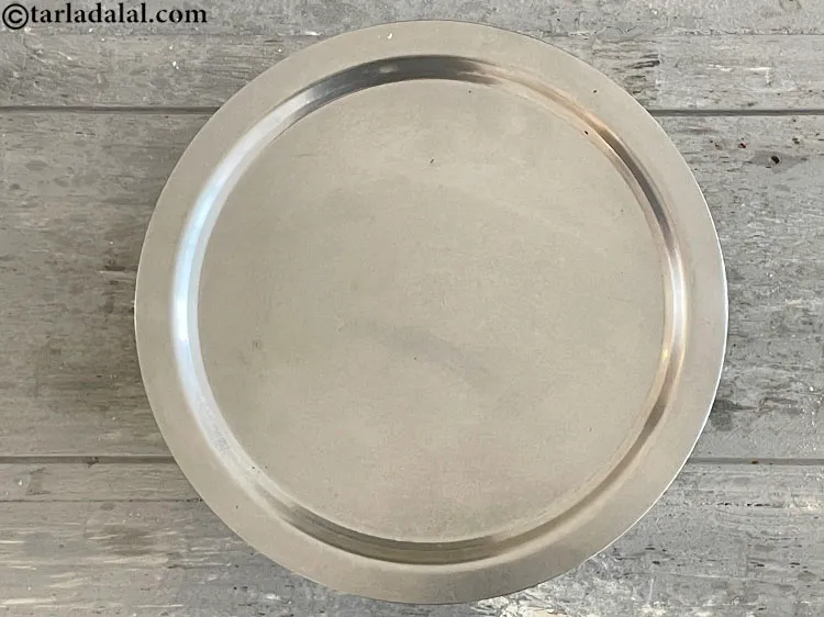 Step 11 – Cover the dough with a lid&nbsp;and keep aside for 15 minutes.