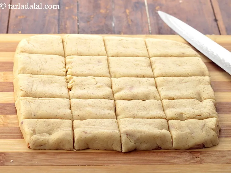 Step 36 – Cut the rolled dough into 50 mm. X 50 mm. (2&rdquo; x 2&rdquo;) equal square …