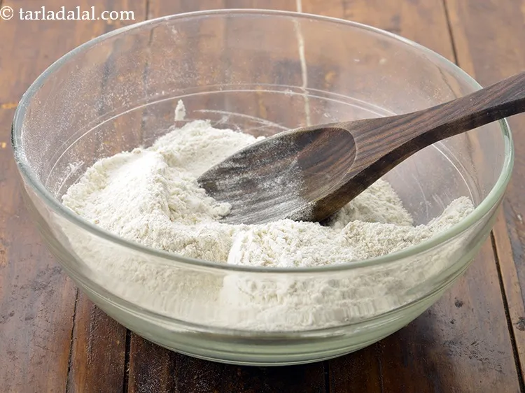 Step 30 – Add the plain flour-almond mixture to it.&nbsp;<br /> &nbsp;