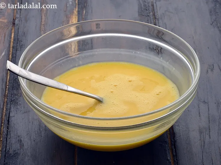 Step 3 – Break the eggs in a deep bowl and beat it using a fork. Keep aside.