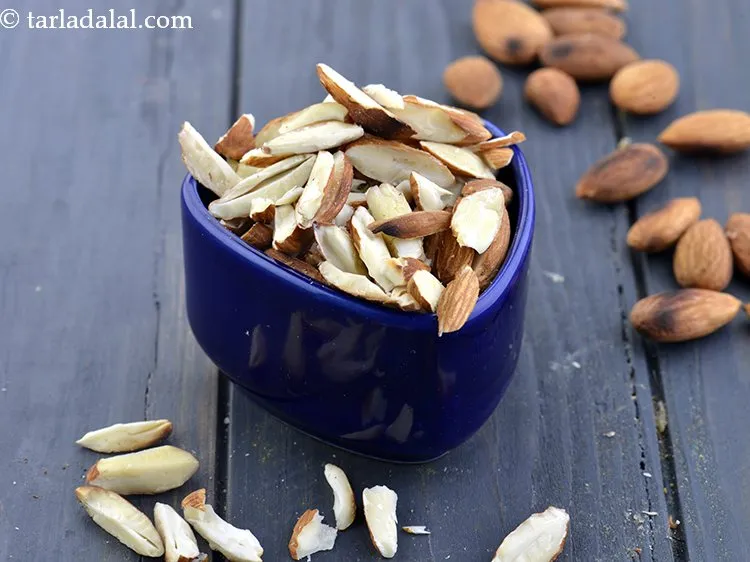 Step 24 – Add 1/4 cup&nbsp;<a href="https://www.tarladalal.com/glossary-almond-slivers-slivered-almonds-664i">almond (badam) slivers</a>. To make almond slivers, place a almond on a …