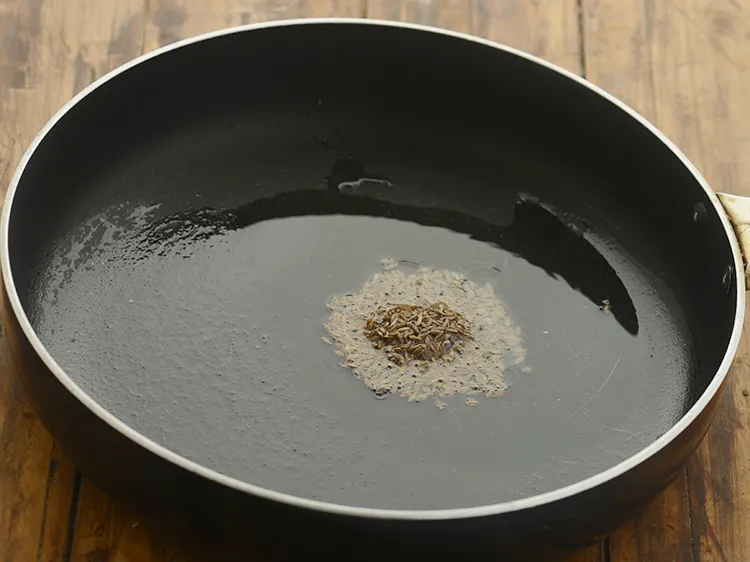 Step 14 – <p>Once the oil is hot, add the cumin seeds.</p>