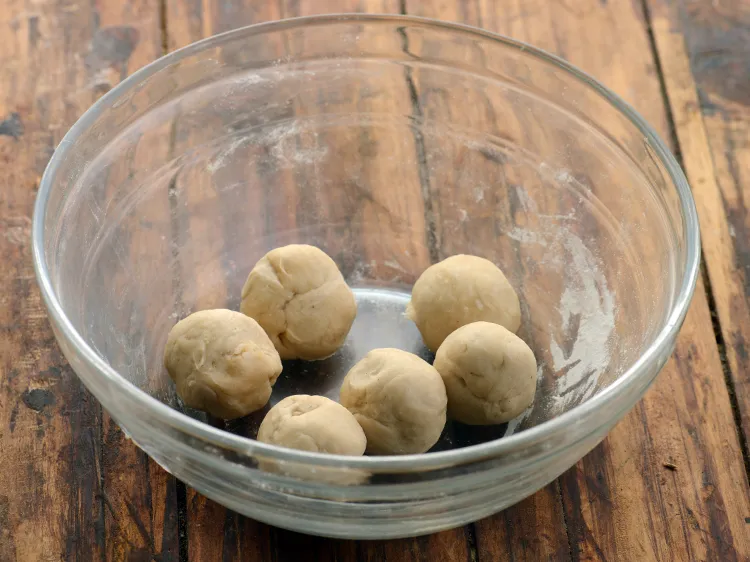 Step 7 – <p>Divide the dough into 6 equal portions.</p>