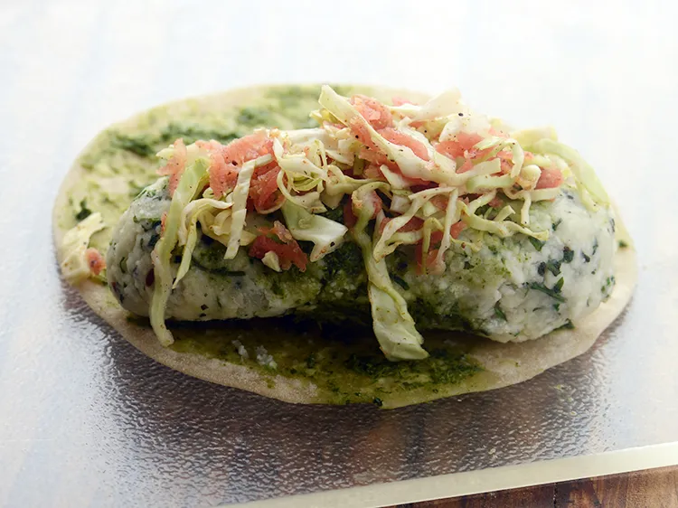 Step 32 – <p>Place 1 portion of the salad over the stuffing.</p>