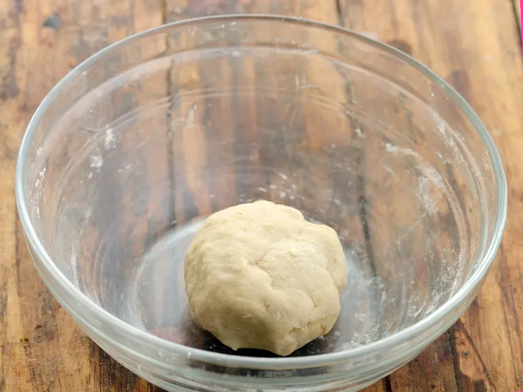 Step 6 – <p>Add approx. 3 tbsp of water to form a soft dough.</p>