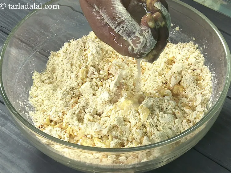 Step 55 – Since we have used mashed potatoes, you will require very little water for kneading the …