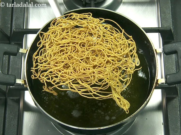 Step 46 – Repeat steps 3 to 9 to deep-fry the remaining <strong>aloo bhujia recipe | crunchy aloo …