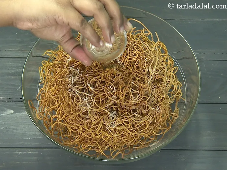 Step 50 – Add 1 tsp&nbsp;<a href="https://www.tarladalal.com/glossary-chaat-masala-300i">chaat masala</a>&nbsp;evenly over it.