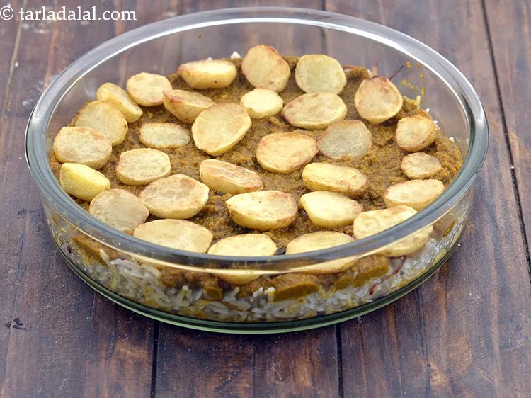 Step 67 – Place the deep-fried potato halves on it.