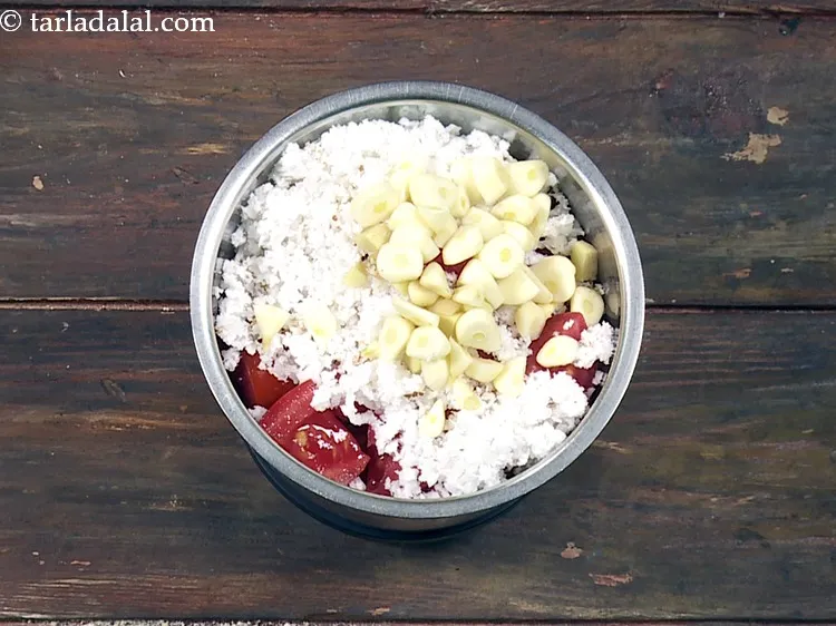 Step 38 – Add 1 tbsp&nbsp;roughly&nbsp;<a href="https://www.tarladalal.com/glossary-chopped-garlic-790i">chopped garlic (lehsun)</a>.