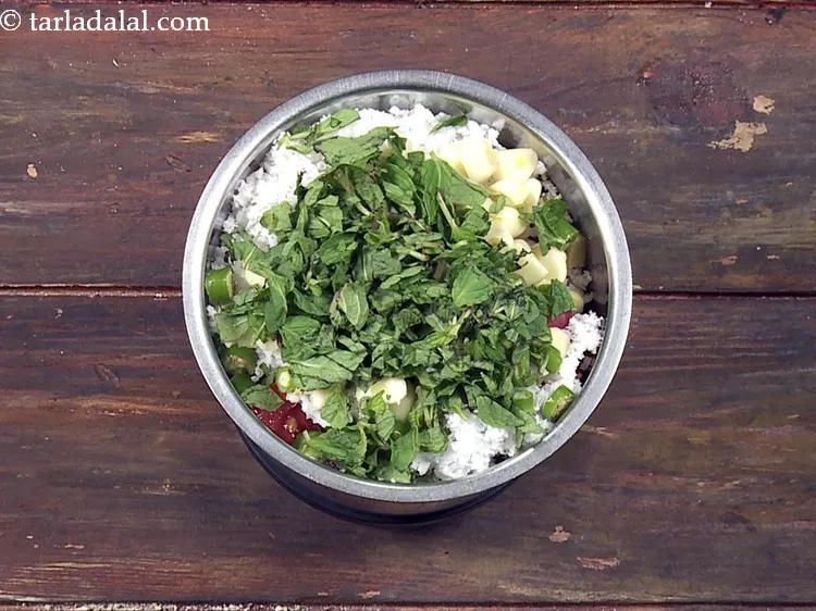 Step 40 – Add 2 tbsp&nbsp;<a href="https://www.tarladalal.com/glossary-chopped-mint-788i">chopped mint leaves (phudina)</a>.