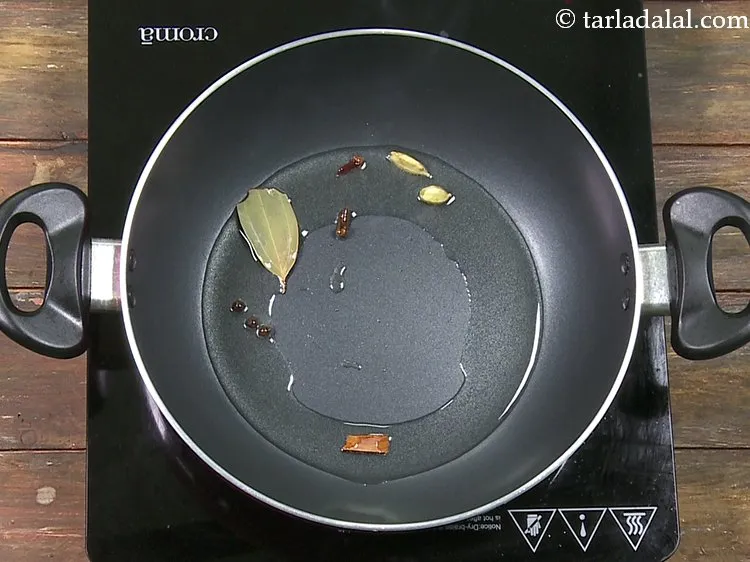 Step 50 – Add 1&nbsp;small stick&nbsp;<a href="https://www.tarladalal.com/glossary-cinnamon-dalchini-346i">cinnamon (dalchini)</a>.