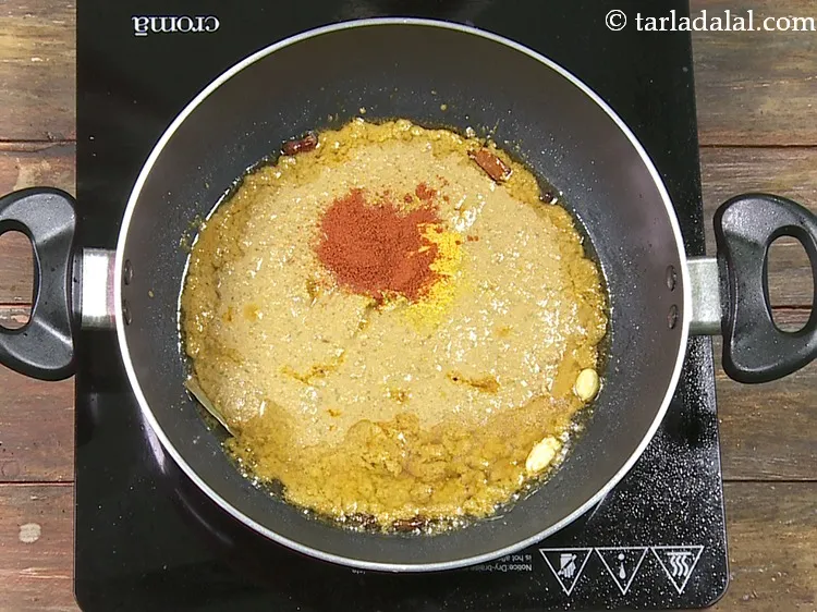 Step 54 – Add 1 tsp&nbsp;<a href="https://www.tarladalal.com/glossary-chilli-powder-red-chilli-powder-339i">chilli powder</a>.