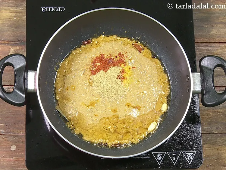 Step 55 – Add 1 1/2 tsp&nbsp;<a href="https://www.tarladalal.com/glossary-coriander-powder-dhania-powder-370i">coriander (dhania) powder</a>.