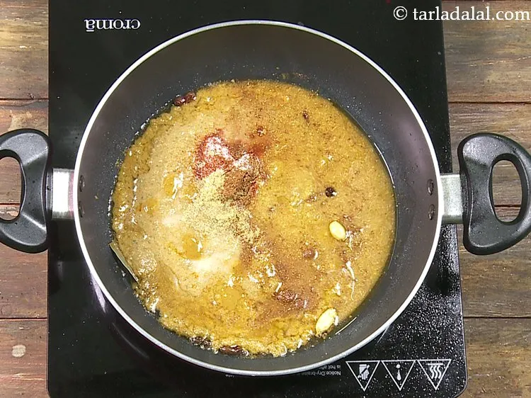 Step 58 – Add &frac12; cup of water. This is to adjust the consistency of the gravy.