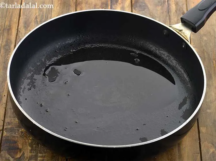 Step 18 – Heat the remaining 1 tbsp oil in a broad non-stick pan.