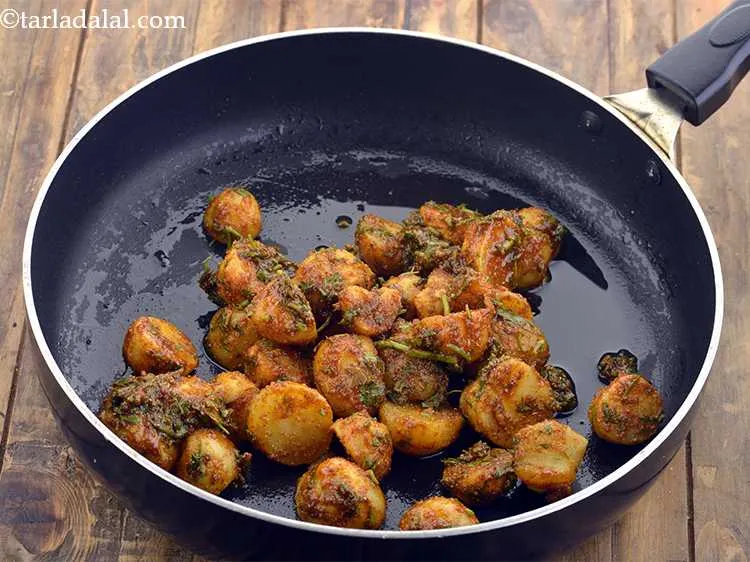 Step 19 – Add the prepared marinated potatoes and mix well. Be sure to mix them gently so …