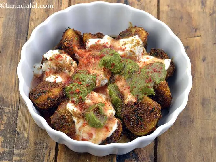 Step 26 – Sprinkle a pinch of cumin seeds powder and chilli powder.