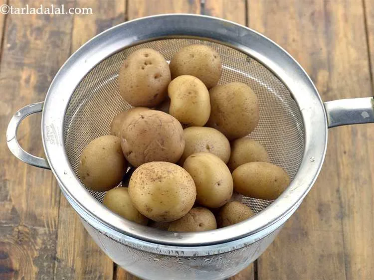 Step 5 – Turn off the heat and drain the potatoes.