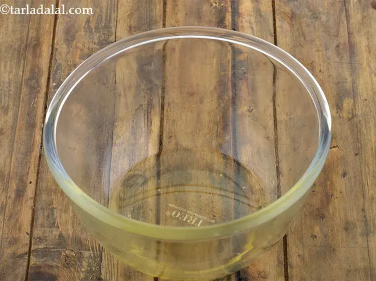 Step 8 – For the marinade of <strong>aloo chaat recipe,</strong> take a medium sized deep bowl and add …