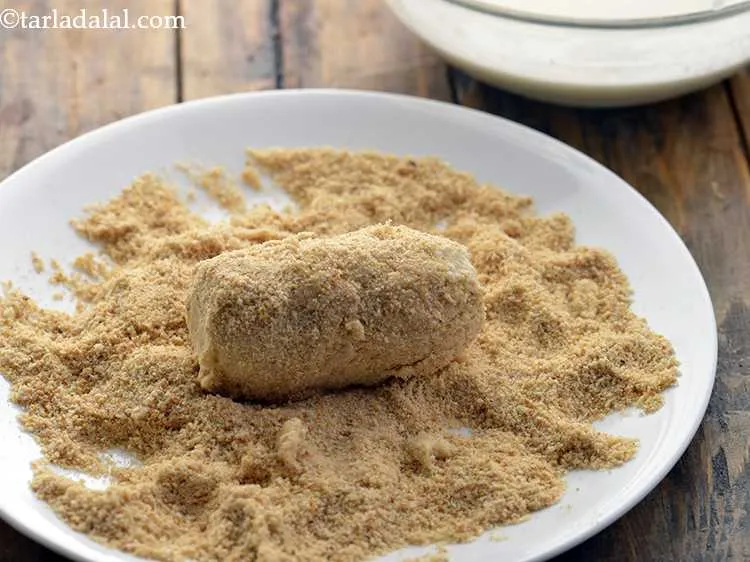 स्टेप 21 – इसे ब्रेड क्रम्ब्स में रोल करें जब तक यह सभी …