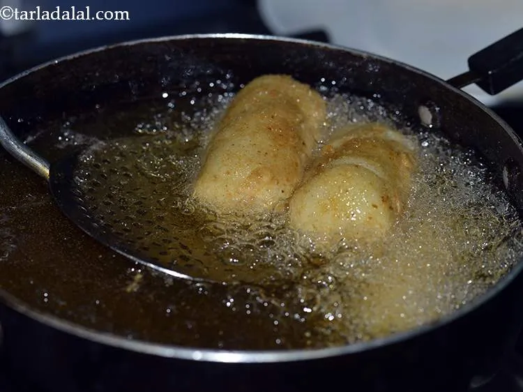 Step 25 – Depending upon the size of you pan, deep-fry 2-3 potato cheese croquettes.