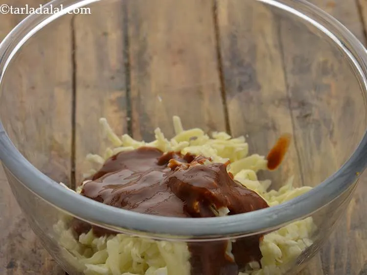 Step 11 – Add the chilli-garlic sauce. The bland cheese takes up the spicy flavour giving tongue-tickling flavour …