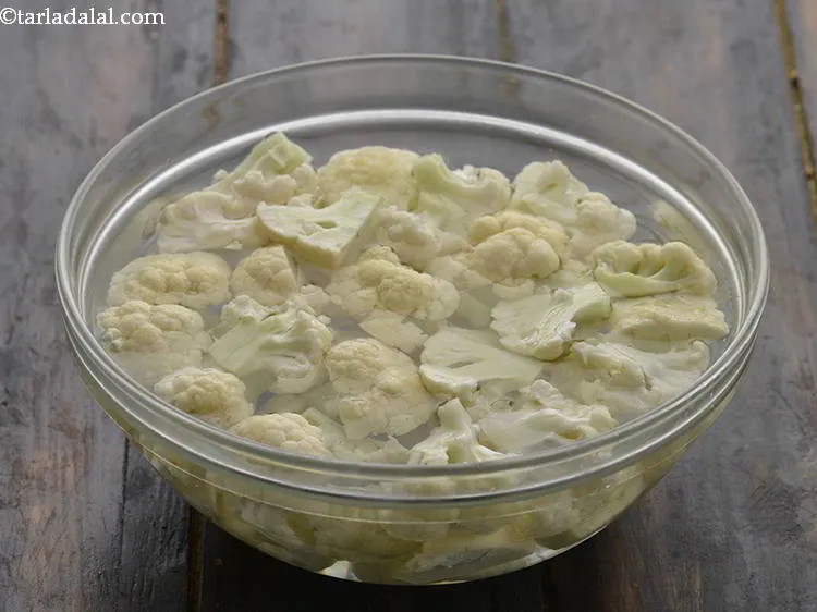 Step 4 – Place the cauliflower florets in warm water for atleast 10 minutes to remove any insects …