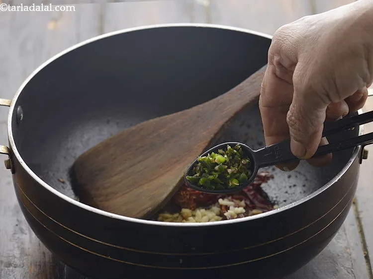 Step 11 – Add the green chillies.