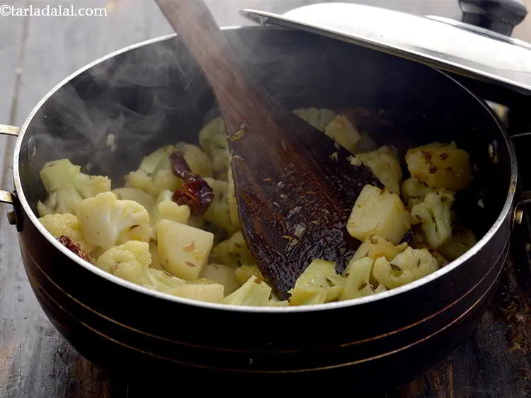 Step 17 – Mix well and cover with a lid and cook on a medium flame for 5 …