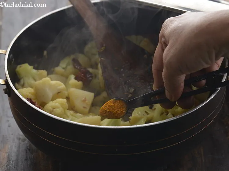 Step 18 – Add the turmeric powder.&nbsp;