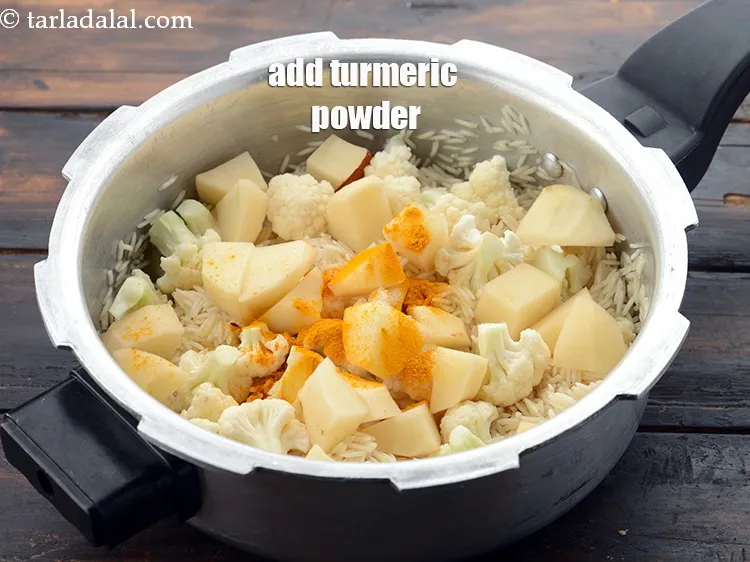 Step 16 – Add 1/2 tsp&nbsp;<a href="https://www.tarladalal.com/glossary-turmeric-powder-haldi-645i">turmeric powder (haldi)</a>.