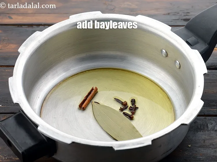 Step 10 – Add 2&nbsp;<a href="https://www.tarladalal.com/glossary-bayleaf-tejpatta-tej-patta-189i">bayleaves</a>.