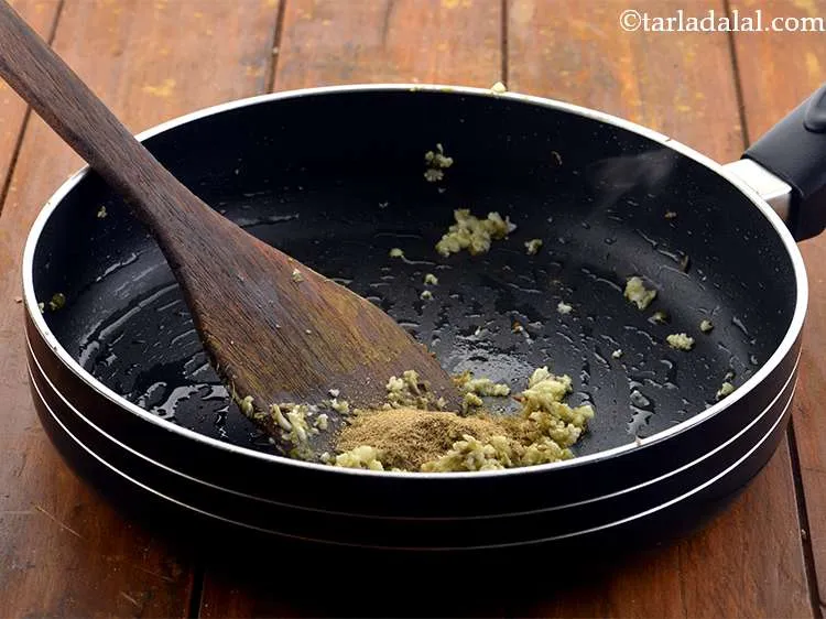 Step 6 – Now we will add the masalas. First add the coriander powder for an earthy taste.