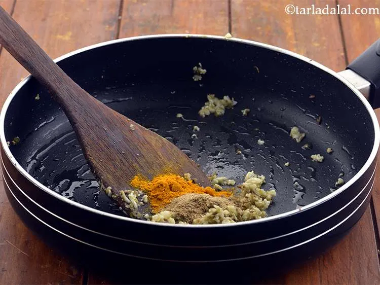 Step 7 – Then add the turmeric powder.
