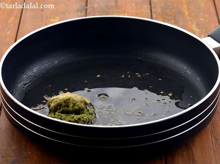 Step 3 – When the seeds crackle, add the ginger-green chilli paste to it. <a href="https://www.tarladalal.com/Ginger-Green-Chilli-Paste-33529r">Ginger-green chilli</a> paste …