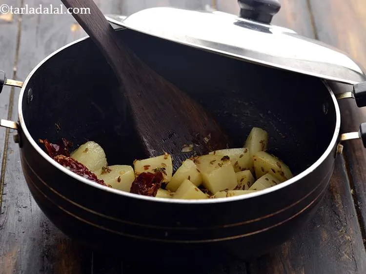 Step 14 – Mix well and cover with as lid and cook on a medium flame for 3 …