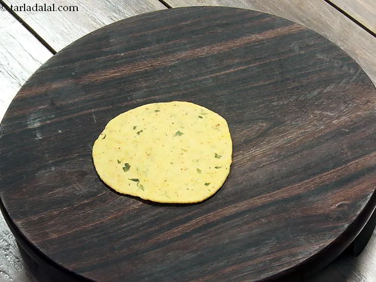 Step 17 – To prepare&nbsp;<strong>aloo ki puri | aloo poori | masala poori |</strong>&nbsp;shape the portion into a …