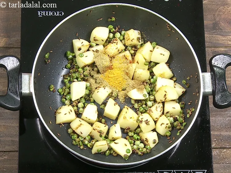 Step 14 – Add 1/4 tsp&nbsp;<a href="https://www.tarladalal.com/glossary-turmeric-powder-haldi-645i">turmeric powder (haldi)</a>.