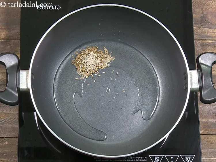 Step 4 – Add 1 tsp&nbsp;<a href="https://www.tarladalal.com/glossary-cumin-seeds-jeera-zeera-381i">cumin seeds (jeera)</a>.